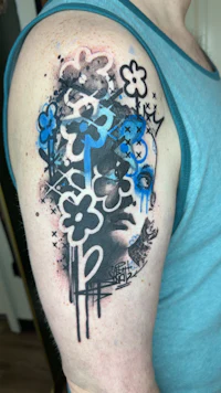 a tattoo of an astronaut on a thigh